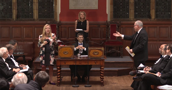 Speakers line up in the debate on nonfinancial corporate reporting in the Oxford Union chamber.