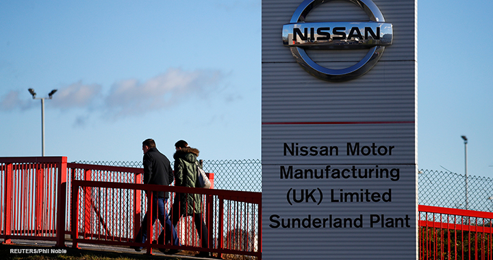 People walk past a sign at the Nissan car plant in Sunderland, Britain, 4 February 2019. (Reuters/Phil Noble)