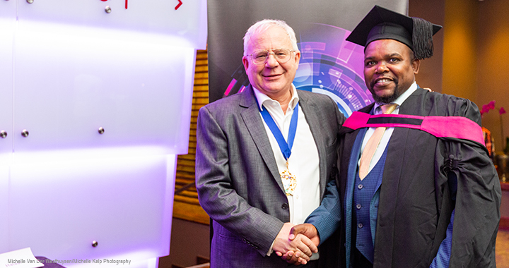 CIMA Africa graduation CIMA president Steven Swientozielskyj with a Diploma in Management Accounting graduate in Gauteng, South Africa.