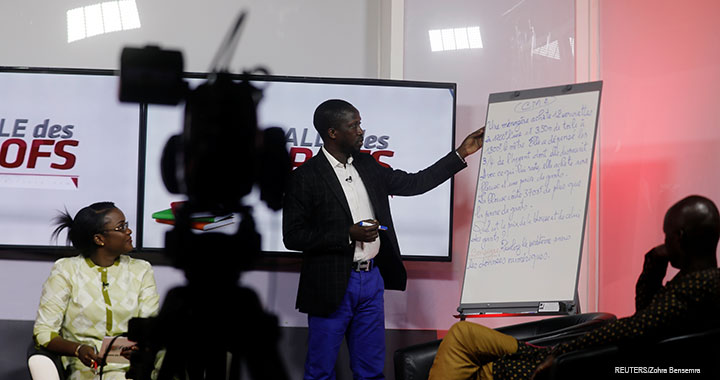 Dame Seck, a school inspector and former teacher, is seen during the recording of a local TV channel program called Salle des Profs (Teachers' Room), a daily learning program for children forced to stay at home because of coronavirus disease in Dakar, Senegal, 17 March 2020.