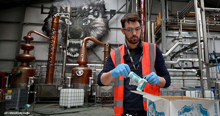 BrewDog’s senior distiller, Jamie Muir, packages hand sanitiser for distribution. After making the switch to producing hand sanitiser, the company distributed the first batch within a few days, to healthcare services, charities, and other frontline workers.