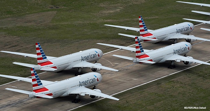 American Airlines passenger planes crowd a runway where they are parked due to flight reductions to slow the spread of coronavirus disease (COVID-19), at Tulsa International Airport in Tulsa, Oklahoma, 23 March 2020.