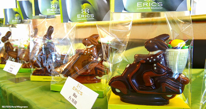 Chocolate Easter bunnies on scooters are displayed at Eric's Confiserie Baumann in Zurich, Switzerland, 11 March 2021.