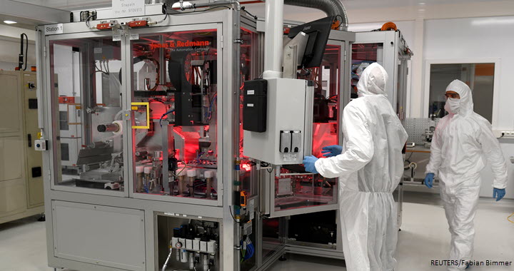 Employees of German carmaker Volkswagen work on a production line in VW's new battery plant in Salzgitter, Germany, 23 September 2019.