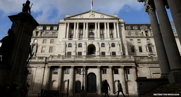 People walk past the Bank of England, in London, Britain October 31, 2021.
