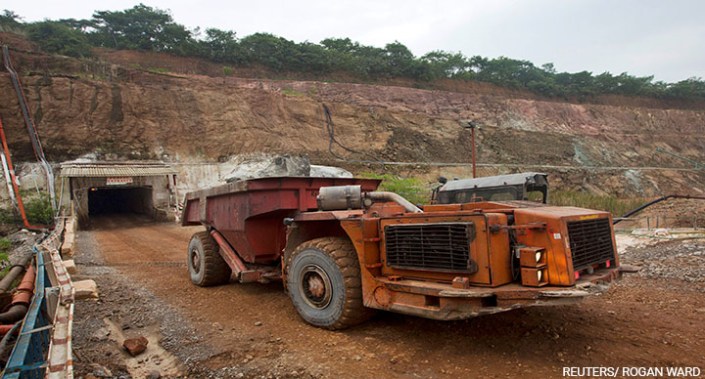A truck exits the mine after collecting ore from 516 metres below the surface at the Chibuluma copper mine in the Zambian copperbelt region, 17 January 2015.