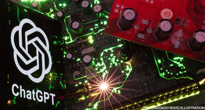 A smartphone with a displayed ChatGPT logo is placed on a computer motherboard in this illustration of 23 February 2023.