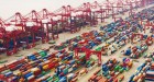 Photo of shipping containers on a dock. PHOTO BY AN QI WANG/ADOBE STOCK