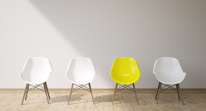 Three white chairs and a yellow one Steps to take when job applications aren’t landing interviews